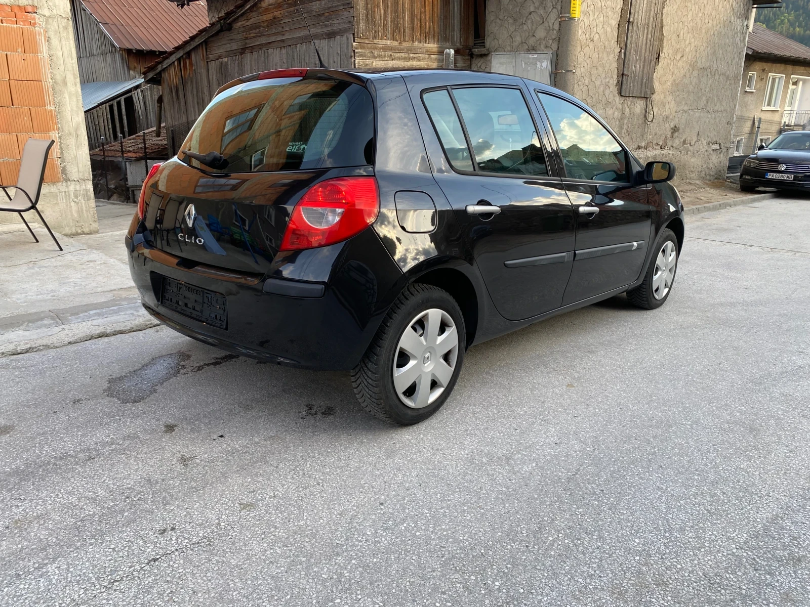 Renault Clio 1.2i 75кс., снимка 7 - Автомобили и джипове - 54671915