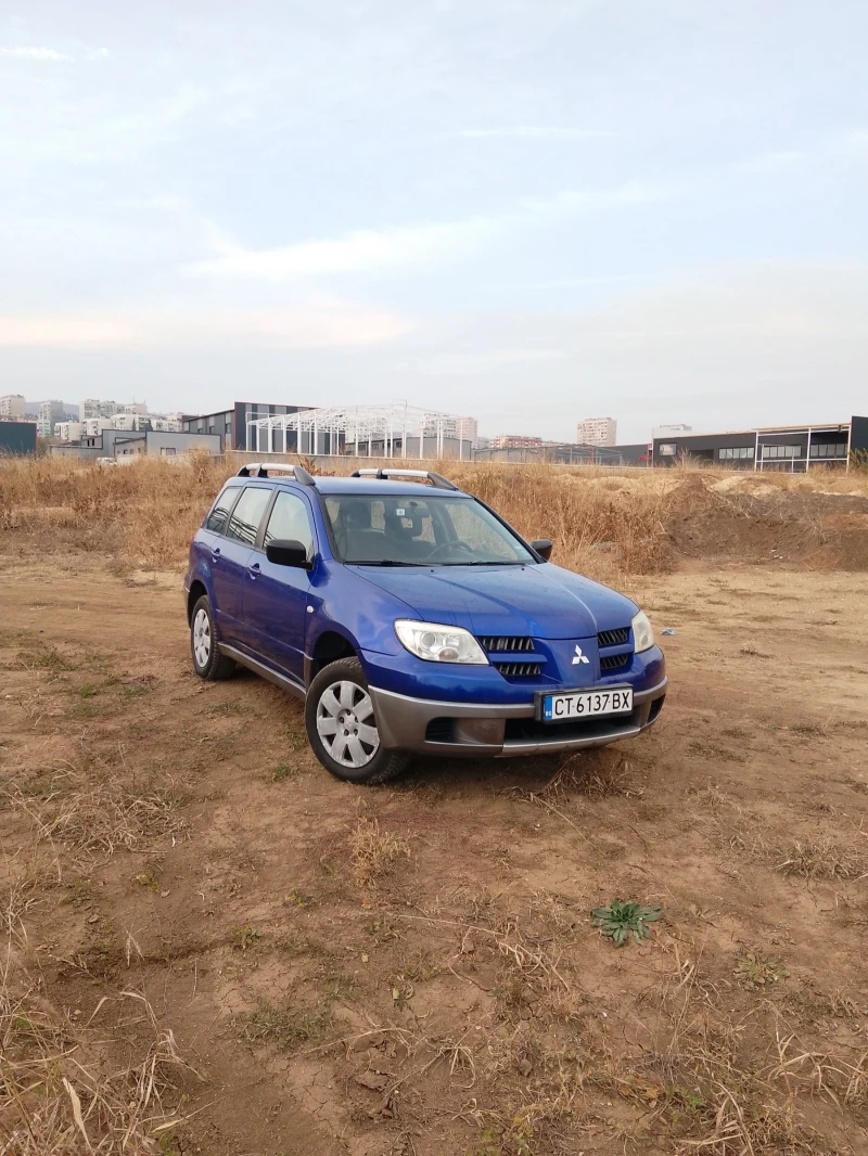 Mitsubishi Outlander 2.0 136 LPG 4X4, снимка 12 - Автомобили и джипове - 51952921
