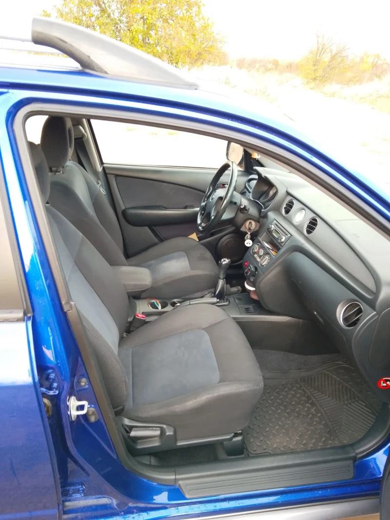 Mitsubishi Outlander 2.0 136 LPG 4X4, снимка 5 - Автомобили и джипове - 51952921