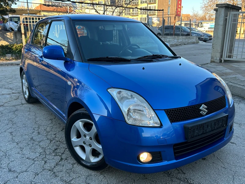 Suzuki Swift 1.3i КЛИМАТИК, снимка 3 - Автомобили и джипове - 52929157