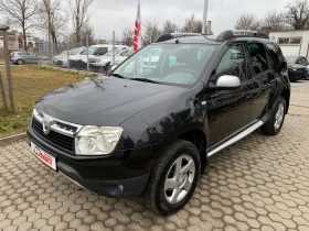 Dacia Duster 1.6i, снимка 1