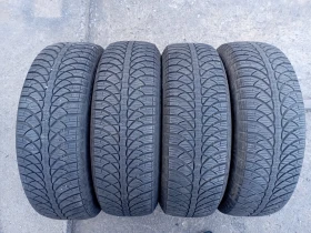 Гуми Зимни 185/65R15, снимка 2 - Гуми и джанти - 47510207