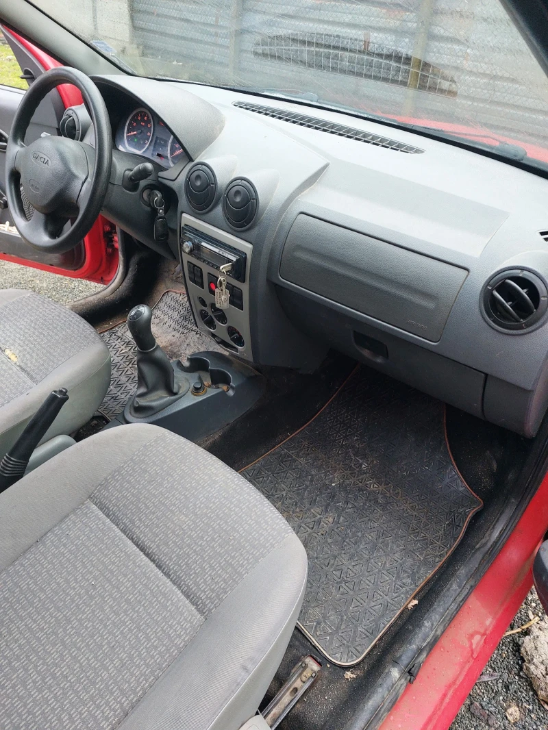Dacia Logan, снимка 11 - Автомобили и джипове - 53433379