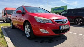 Opel Astra Astra J Sports Tourer 2011, снимка 3