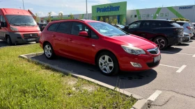 Opel Astra Astra J Sports Tourer 2011, снимка 1
