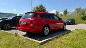 Opel Astra Astra J Sports Tourer 2011, снимка 4