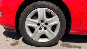 Opel Astra Astra J Sports Tourer 2011, снимка 14