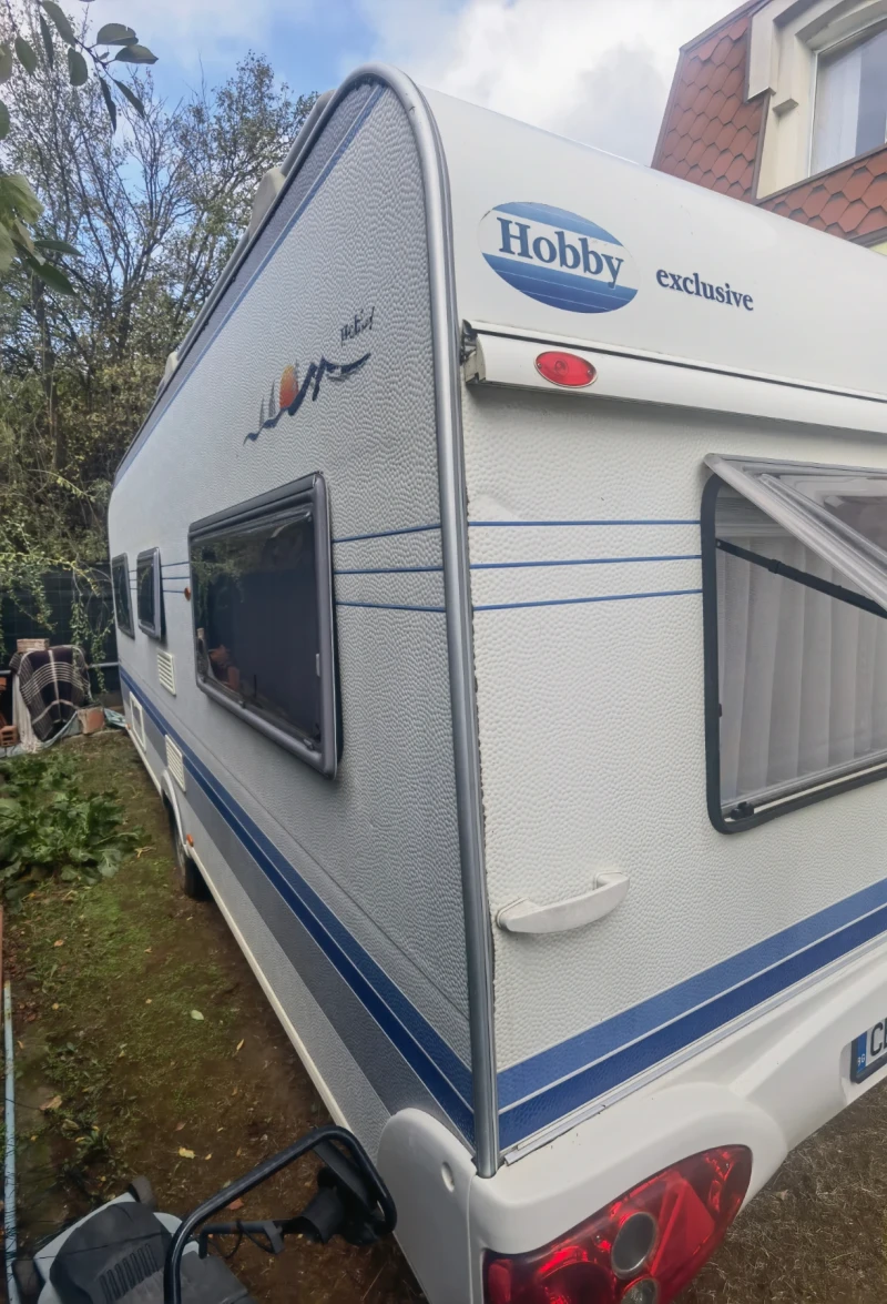 Каравана Hobby Exclusive prestige 560, снимка 2 - Каравани и кемпери - 52072669