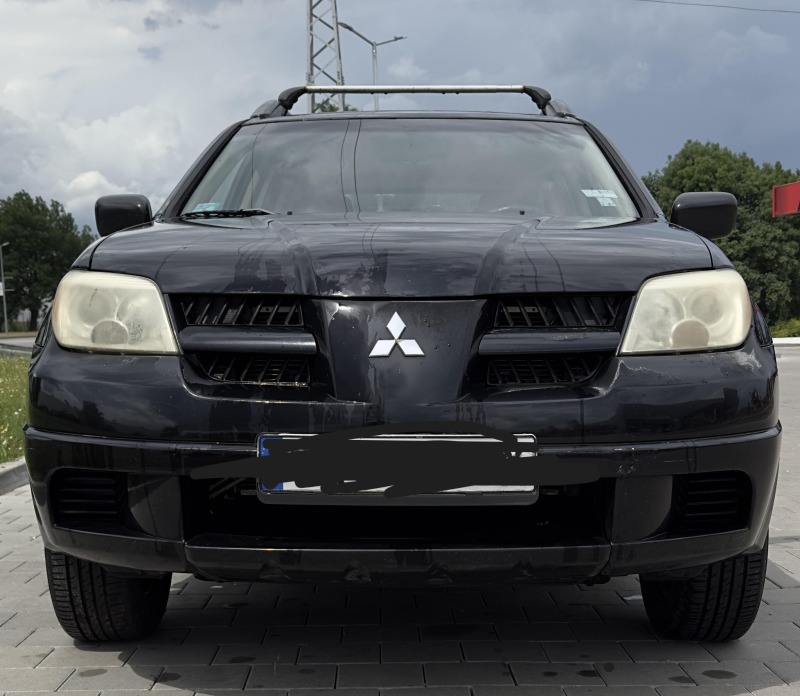 Mitsubishi Outlander 2.4 Газ/Бензин | КОМЕНТАР при сериозен интерес, снимка 1 - Автомобили и джипове - 46141973