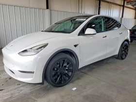 ������ Tesla Model Y