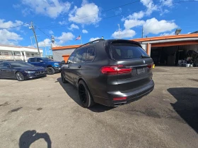 BMW X7 xDrive50i ОБДУХВАНЕ/МАСАЖ/ВАКУУМ/HEAD-UP/FULL - 62699 лв. / 32057.49 € - 28131805 2