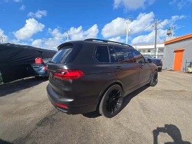 BMW X7 xDrive50i ОБДУХВАНЕ/МАСАЖ/ВАКУУМ/HEAD-UP/FULL - 62699 лв. / 32057.49 € - 28131805 3