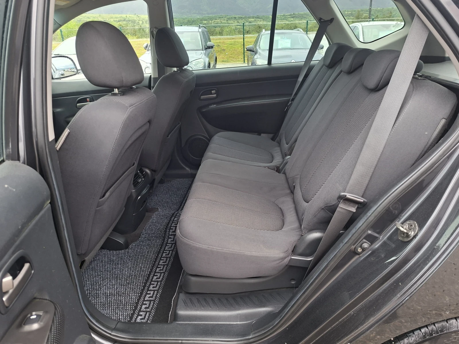 Kia Carens 2, 0 crd , снимка 13 - Автомобили и джипове - 54580023