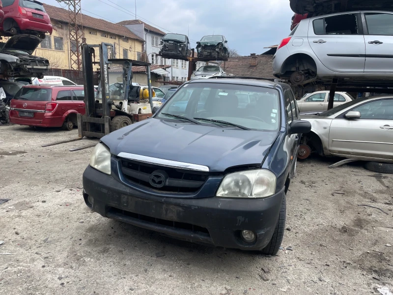 Mazda Tribute, снимка 3 - Автомобили и джипове - 49044711