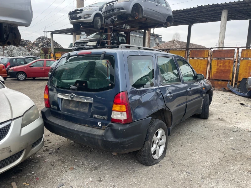 Mazda Tribute, снимка 2 - Автомобили и джипове - 49044711