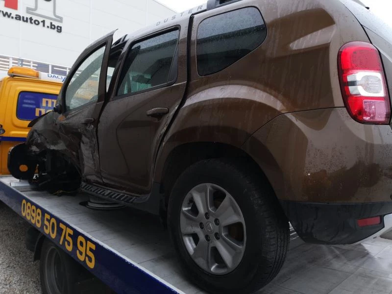 Dacia Duster 1.5DCI/1.6 16, снимка 9 - Автомобили и джипове - 47279420