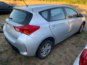     Toyota Auris 1.8i, Hybrid, 99 .