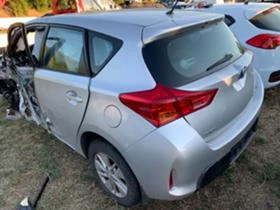     Toyota Auris 1.8i, Hybrid, 99 .