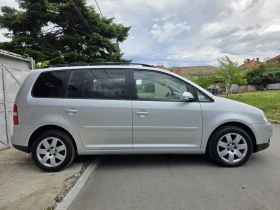 VW Touran 2.0TDI 7-местен с работещ климатроник  - 2850 € / 5574.12 лв. - 65647518 8