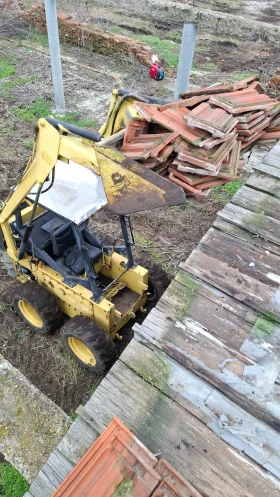 Мини челни товарачи Bobcat 611, снимка 1