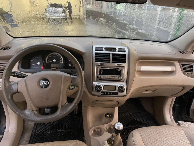 Kia Sportage 2 CRDI 4x4, снимка 7 - Автомобили и джипове - 52643478