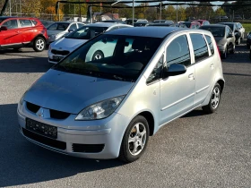 ������ Mitsubishi Colt