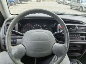 Suzuki Grand vitara 4x4 Klima, снимка 14 - Автомобили и джипове - 40685432