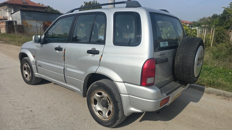 Suzuki Grand vitara 2.0i, снимка 6 - Автомобили и джипове - 52576650