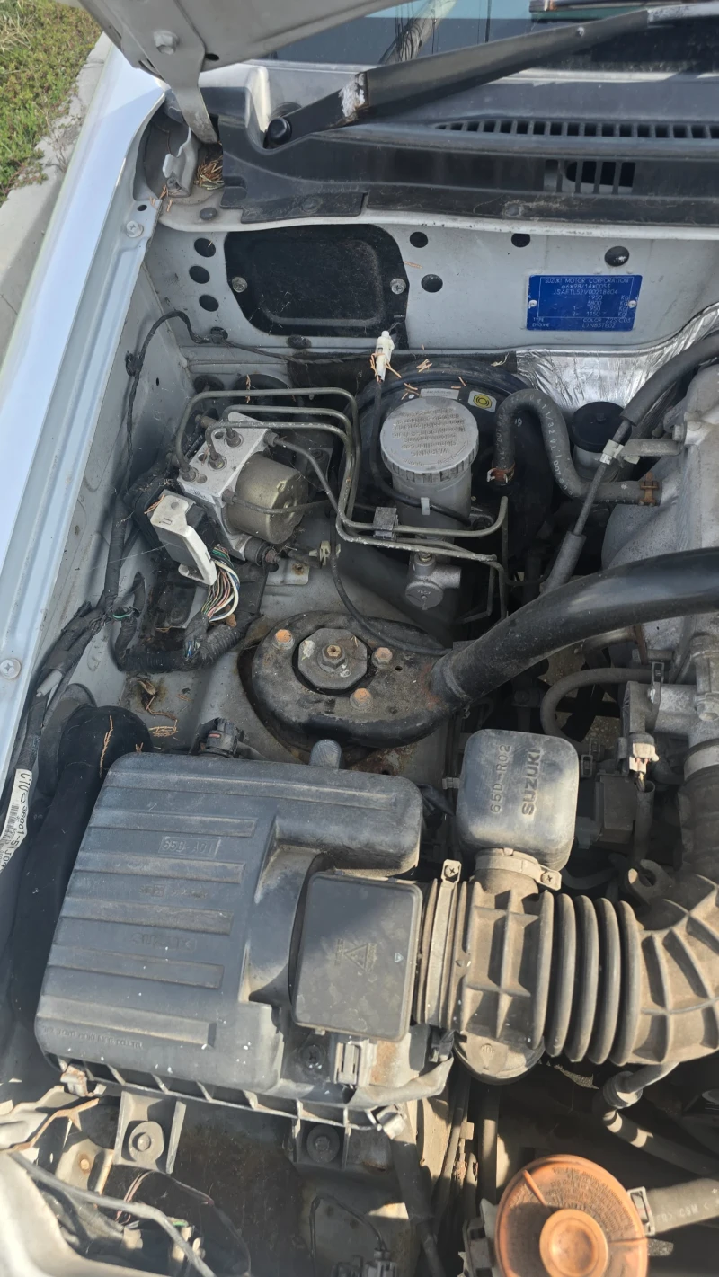 Suzuki Grand vitara 2.0i, снимка 10 - Автомобили и джипове - 52576650