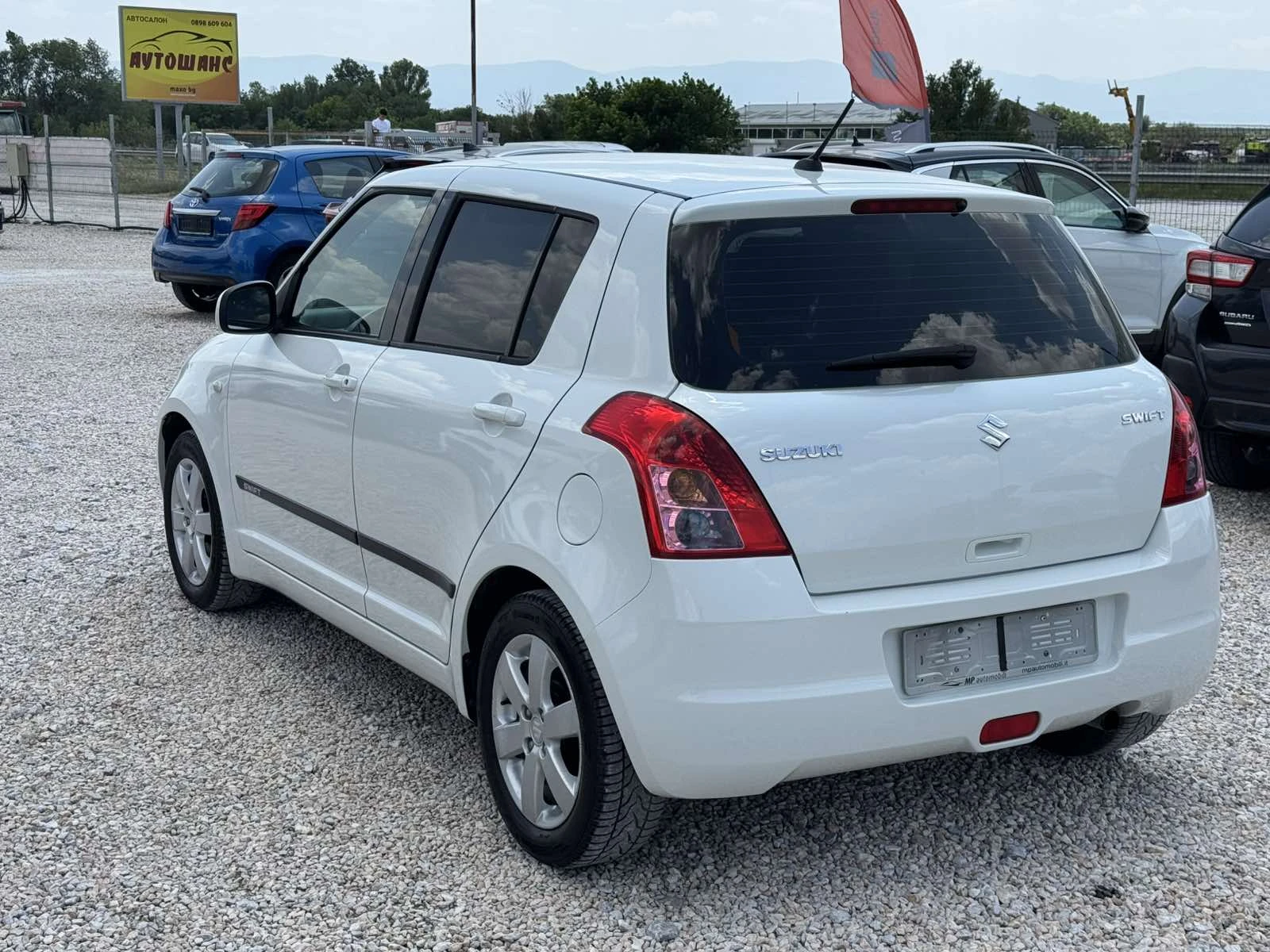 Suzuki Swift 1.33i - изображение 6