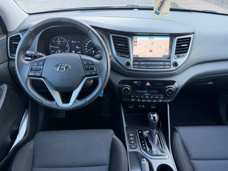 Hyundai Tucson 2.0CRDI 4WD, снимка 11 - Автомобили и джипове - 52847162