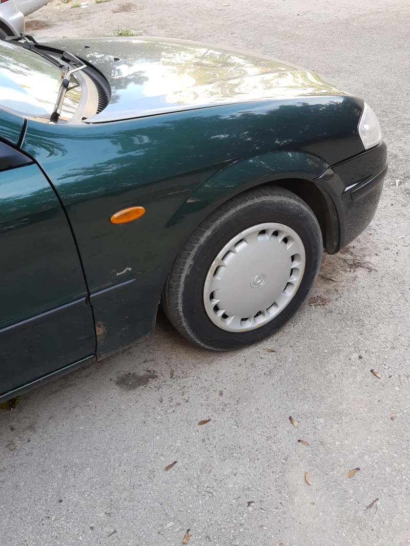 Mazda 323, снимка 5 - Автомобили и джипове - 47911016