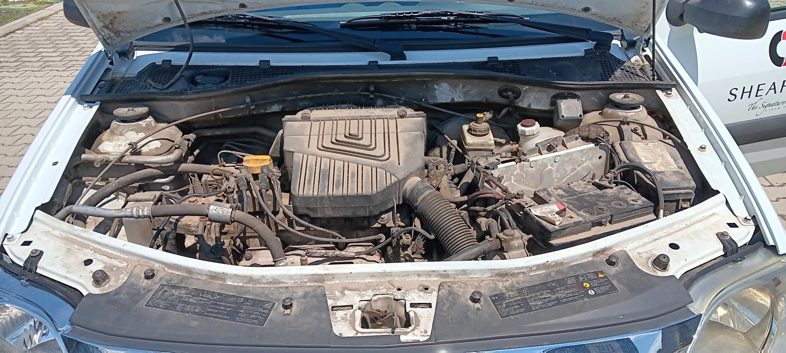 Dacia Logan, снимка 5 - Автомобили и джипове - 54638135