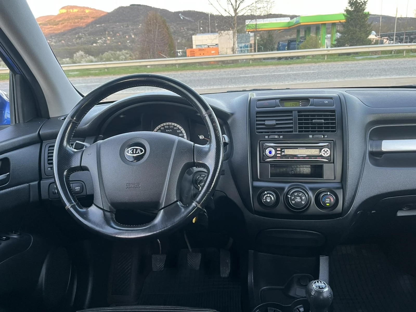 Kia Sportage 2.0CRDI 113кс 134 000км  4X4 КЛИМАТИК, снимка 12 - Автомобили и джипове - 54163193