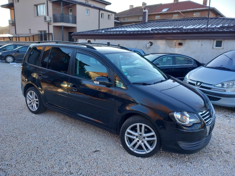 VW Touran 2.0TDI BMM NAVI, снимка 17 - Автомобили и джипове - 48731265