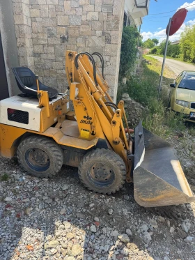 Челен товарач Komatsu SK 04, снимка 1