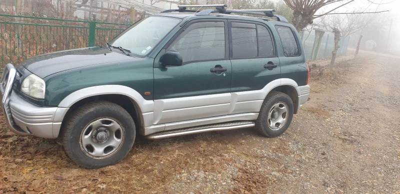 Suzuki Grand vitara, снимка 4 - Автомобили и джипове - 48034406