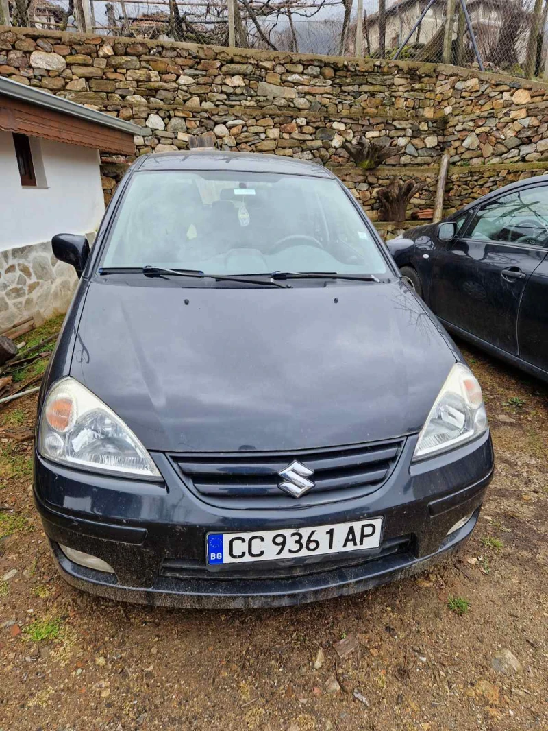 Suzuki Liana, снимка 10 - Автомобили и джипове - 47172277