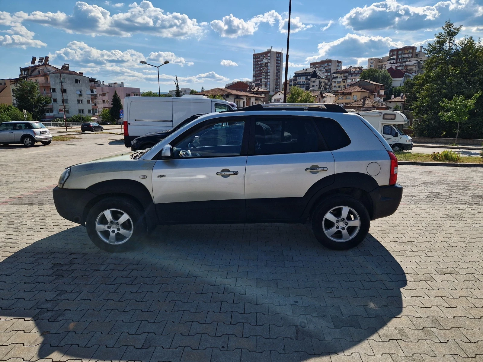 Hyundai Tucson 2.0i  4х4 + газ. уредба , снимка 7 - Автомобили и джипове - 55416397