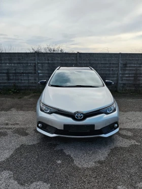 Toyota Auris TS Hybrid + GAS (гори 5 евро /100км), снимка 1
