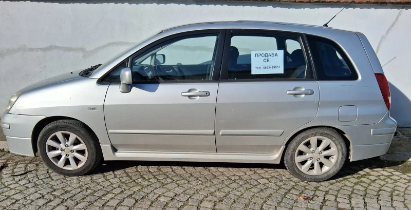 Suzuki Liana, снимка 13 - Автомобили и джипове - 52856277