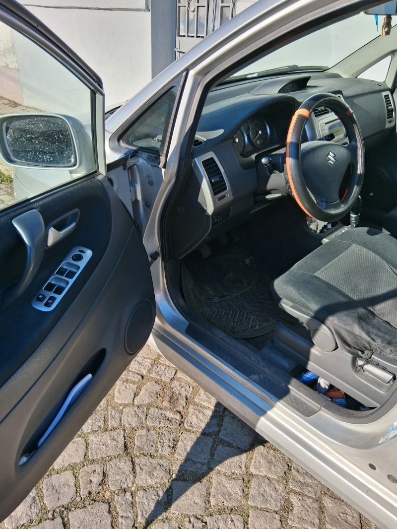 Suzuki Liana, снимка 6 - Автомобили и джипове - 52856277