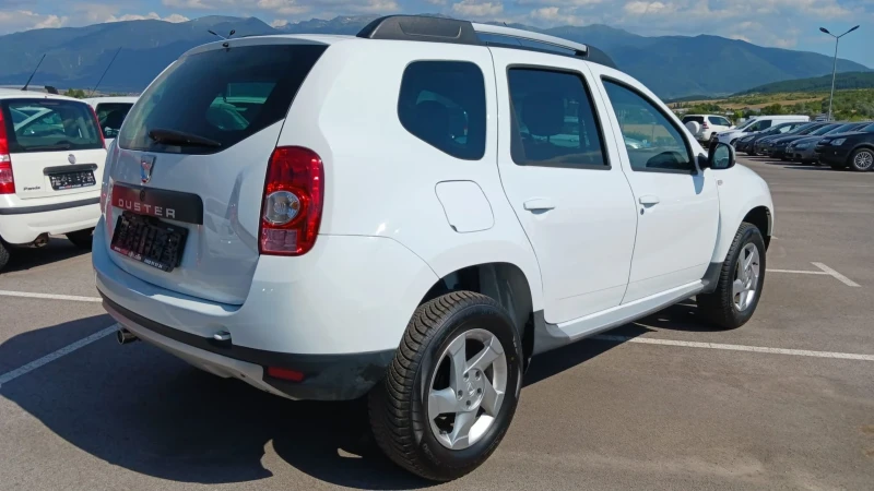 Dacia Duster 1.6, снимка 4 - Автомобили и джипове - 50854326
