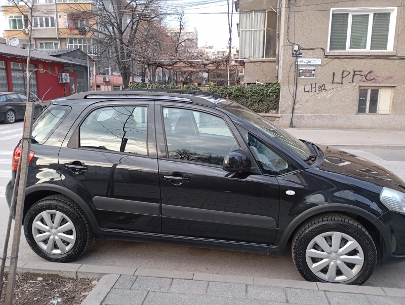 Suzuki SX4, снимка 14 - Автомобили и джипове - 48821560