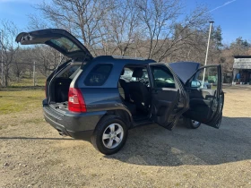 Kia Sportage 2.0i 4X4, снимка 6
