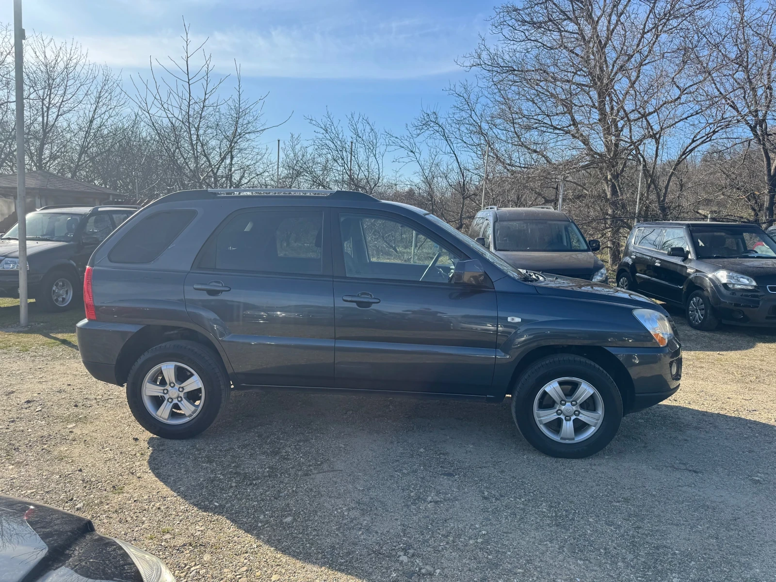 Kia Sportage 2.0i 4X4, снимка 4 - Автомобили и джипове - 53802969