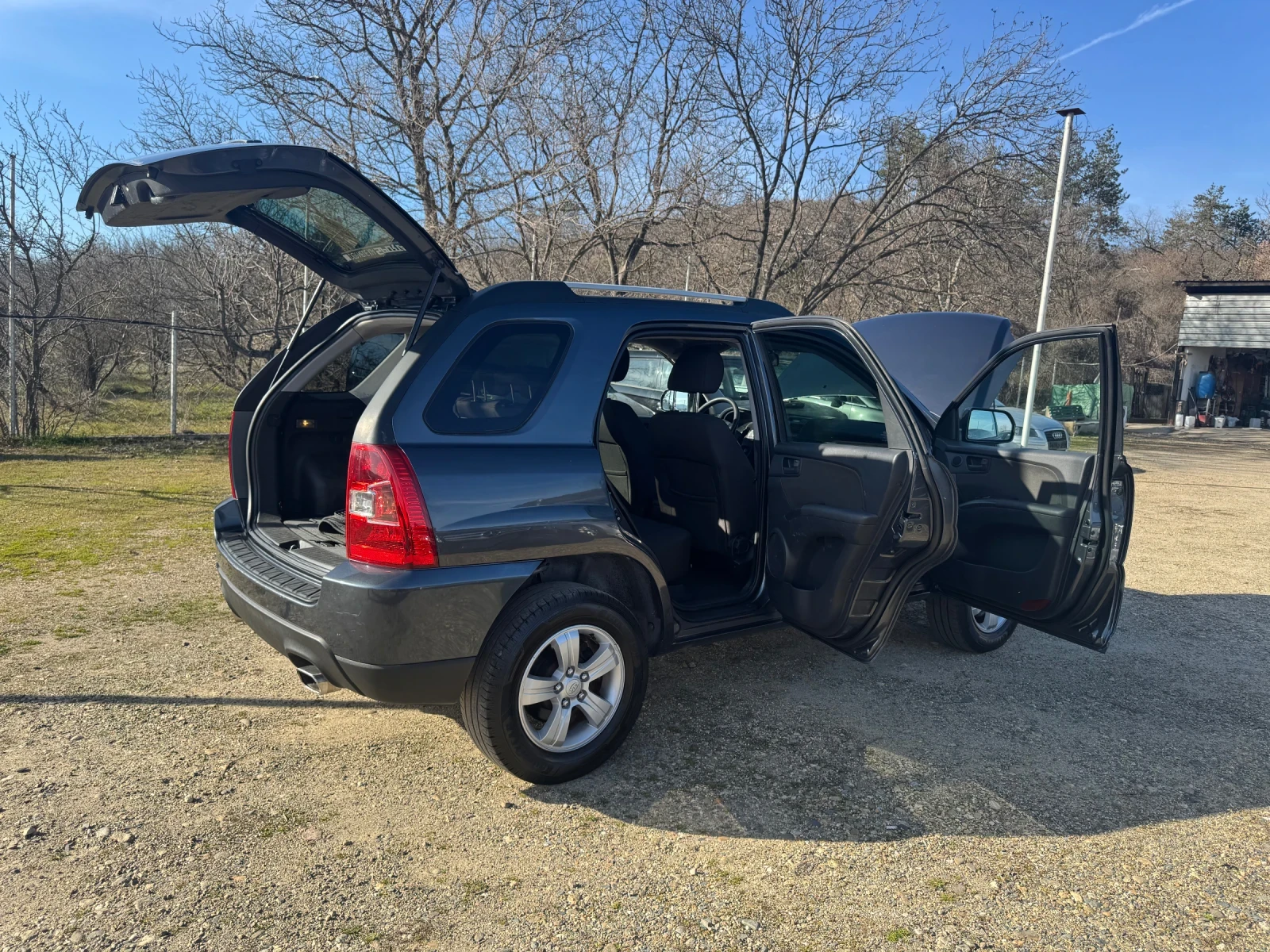 Kia Sportage 2.0i 4X4, снимка 6 - Автомобили и джипове - 53802969