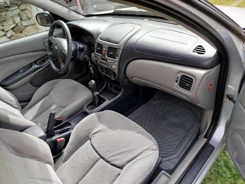 Nissan Almera, снимка 12 - Автомобили и джипове - 49609751