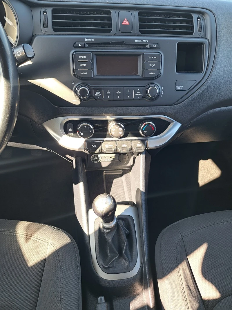 Kia Rio 1,2 i +gaz, снимка 12 - Автомобили и джипове - 46355578