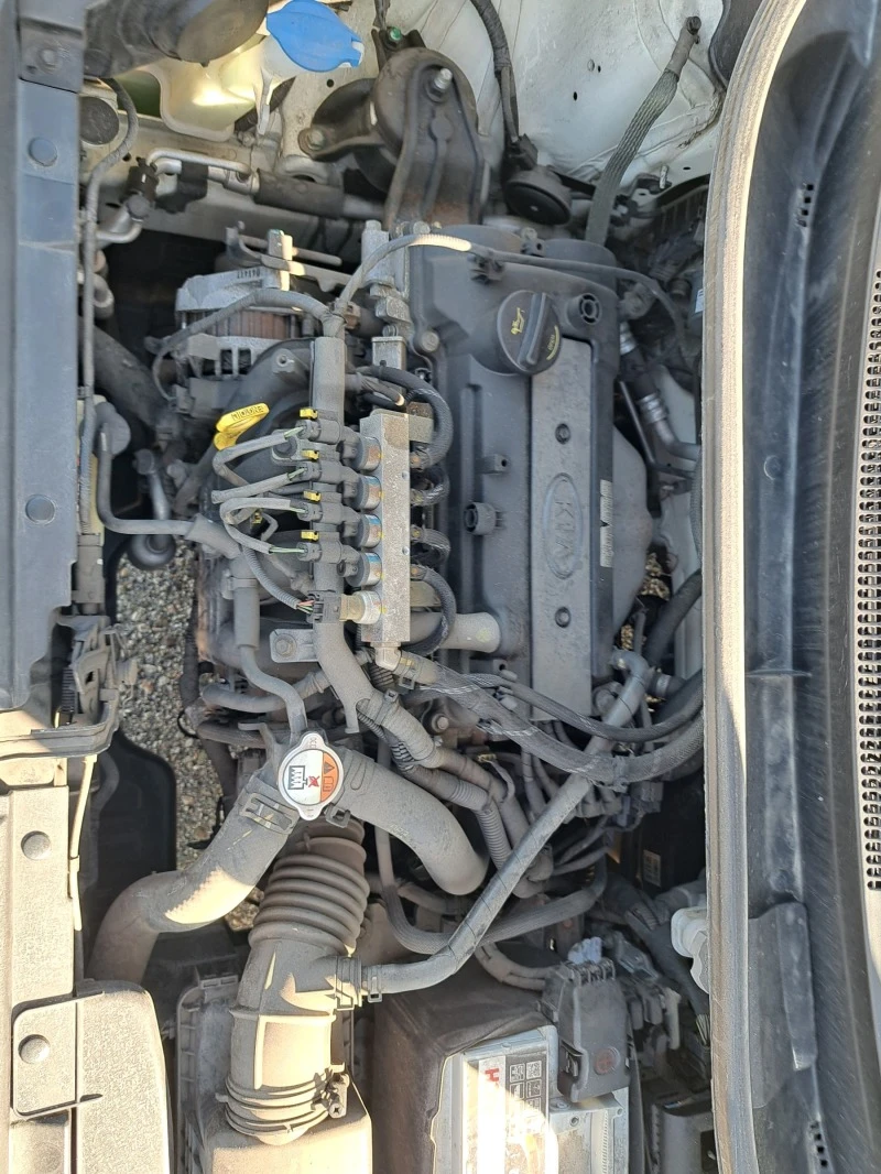 Kia Rio 1,2 i +gaz, снимка 16 - Автомобили и джипове - 46355578